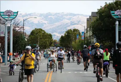  ?? STAFF FILE PHOTO ?? San Jose annually shuts down streets for Viva Callesj, seen here last September. But the city won’t shut down streets to traffic during the pandemic, like other cities have. For one thing, San Jose has 200-plus parks and miles of bike lanes and trails for residents to enjoy.