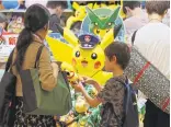  ?? KAZUHIRO NOGI/AGENCE FRANCE-PRESSE VIA GETTY IMAGES ?? Shares in Nintendo fell Monday after it said the Pokémon Go mania wouldn’t translate into bumper profits. Pokémon Go’s release had almost doubled Nintendo’s stock through Friday’s close.