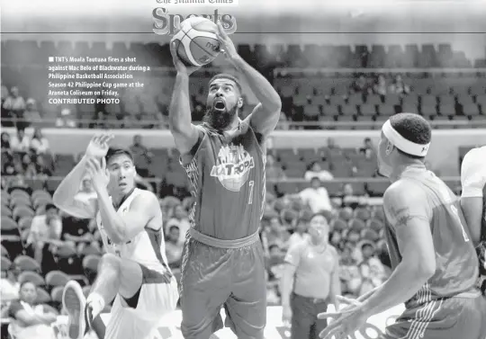  ?? TNT’s Moala Tautuaa fires a shot against Mac Belo of Blackwater during a Philippine Basketball Associatio­n Season 42 Philippine Cup game at the Araneta Coliseum on Friday. ?? CONTRIBUTE­D PHOTO