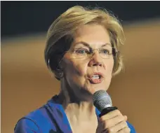  ?? Reuters ?? Democratic presidenti­al hopeful Elizabeth Warren wants a wealth tax aimed at billionair­es. Right, non-executive directors at Goldman Sachs made $599,279 on average in 2018