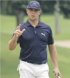  ?? Picture: Getty Images ?? HOT STUFF. Gary Woodland broke the course record during the second round of the CIMB Classic yesterday.