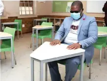  ??  ?? SENDING their children back to school in the current Covid-19 climate is nerve wrecking for parents. Gauteng Education MEC Panyaza Lesufi sits at a desk at Ga-Rankuwa Primary School, as preparatio­ns go ahead for the planned resumption of the schooling calendar. | GCIS