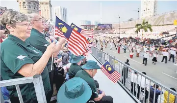  ??  ?? War veterans from Britain and New Zealand were among thousands of people who attended the National Day parade at Dataran Merdeka in Kuala Lumpur yesterday. — Bernama photo