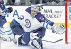  ?? AP PHOTO ?? In this April 9, 2016, file photo, Winnipeg Jets goalie Ondrej Pavelec moves to make a save against the Los Angeles Kings during the second period of an NHL hockey game in Los Angeles.