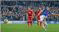  ?? Reuters ?? Everton’s Leighton Baines scores their third goal from a penalty during the match against Watford on Sunday. —