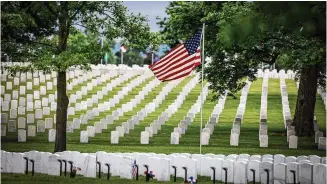  ?? JIM NOELKER/ STAFF ?? U.S. Army Pfc. Chauncey William Sharp was buried at the Dayton National Cemetery on May 21. The Ohio native’s remains were finally identified about 70 years after his death in Korea in 1950.