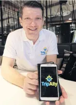  ??  ?? TripAlly chief executive Aleksey Gordienko displays the app.