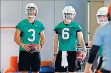  ?? [BRYAN TERRY/ THE OKLAHOMAN] ?? Oklahoma State's Spencer Sanders, left, and Dru Brown could both play in the Cowboys' season opener against Oregon State next week.