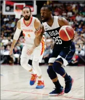  ?? ASSOCIATED PRESS ?? UNITED STATES’ Kemba Walker (right) dribbles past Spain’s Ricky Rubio during the second half of an exhibition basketball game Friday in Anaheim, Calif.