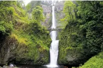 ?? ASSOCIATED PRESS FILE PHOTO ?? Multnomah Falls in the Columbia River Gorge National Scenic Area is seen in 2011. The area, now threatened by wildfire, holds North America’s largest concentrat­ion of waterfalls.