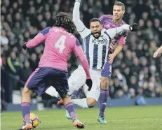  ??  ?? Jack Rodwell fells Albion’s Matt Phillips