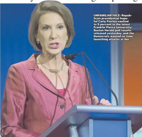  ?? AP PHOTO ?? UNFAMILIAR FACE: Republican presidenti­al hopeful Carly Fiorina vaulted to 9 percent in the latest Franklin Pierce University/ Boston Herald poll results released yesterday, and the Democrats wasted no time launching attacks at her.