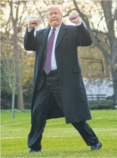  ?? AP ?? President Donald Trump gestures as he walks to Marine One after speaking to media at the White House in Washington on Tuesday.