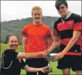  ??  ?? Head teacher Peter Bain presents the trophy to Craig Cook, with Angus Neil second.