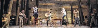  ?? MATTHEW MURPHY PHOTO ?? Newfoundla­nd musician, composer and conducter Greg Hawco (centre, with bodhran) onstage with the rest of the band in the new Canadian production of “Come From Away,” which opened earlier this month in Winnipeg and will soon move to Toronto. “How proud...