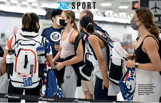  ?? AFP ?? members of the us swimming team arrive for the tokyo 2020 Olympic games at narita internatio­nal airport. —