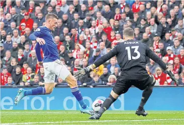  ?? REUTERS ?? Leicester City’s Jamie Vardy, left, in action against Liverpool during a Premier League match at Anfield this season.