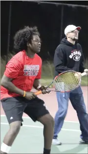  ?? Kevin Myrick / SJ ?? Bulldogs tennis teams take a night out for fun fundraiser following road win. Cedartown’s tennis teams played back and forth on courts for six hours during a marathon fundraiser on Friday, March 2.