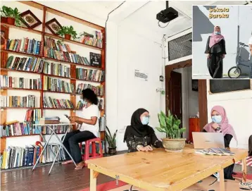  ??  ?? Community helpers: Rayhan (left) with his friends preparing to take homework to the children who are still at home. (Inset) Sekolah Baroka is located on the second floor of a pre-war shophouse in Johor Baru.