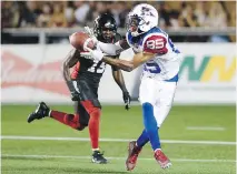  ?? SEAN KILPATRICK/THE CANADIAN PRESS ?? The Alouettes’ B.J. Cunningham has a league-leading average of 18.3 yards per catch this season. He beat the Redblacks’ defensive back Imoan Claiborne for this catch in July.