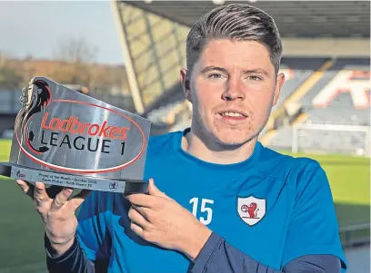  ?? Picture: SNS. ?? Kevin Nesbit with the Ladbrokes League 1 Player of the Month award for October.