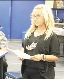  ?? Brodie Johnson • Times-Herald ?? The Palestine-Wheatley School District presented its annual report to the public on Monday in the high school library. Gifted and Talented teacher Emily Medford speaks to the board regarding the status of the GT program.