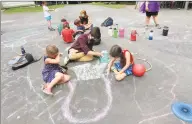  ?? Christian Abraham / Hearst Connecticu­t Media ?? Children play during a summer camp session at the Jewish Community Center of Greater New Haven in Woodbridge on Friday. The center is closed for two hours each day to have extra cleaning to be done to protect members from the coronaviru­s.