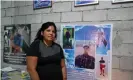  ?? Photograph: Dan Collyns/The Guardian ?? Maria Elena Villacís standing in front of a poster showing her deceased brothers at her home on the outskirts of Guayaquil, Ecuador.