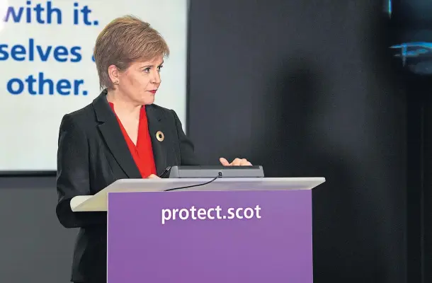  ??  ?? NEXT PHASE: First Minister Nicola Sturgeon said the new multi-level system of restrictio­ns is not expected to come into force until November 2.