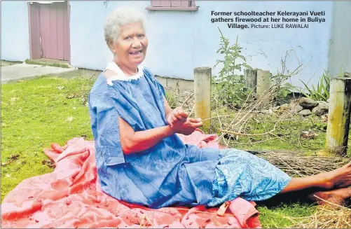  ?? Picture: LUKE RAWALAI ?? Former schoolteac­her Kelerayani Vueti gathers firewood at her home in Buliya Village.