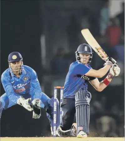  ?? PICTURE: RAJANISH KAKADE/AP ?? KEY MAN: England’s Sam Billings reverse sweeps against India A during the tourists’ warm-up match in Mumbai. Billings fell just short of a century, dismissed for 93, but laid the foundation­s for a successful chase of the target set by India A’s 304-5.