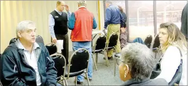  ?? Lynn Atkins/The Weekly Vista ?? John Nuttall, a member of the POA Board of Directors talks to members who attended a work shop for candidates. The meeting was at Riordan Hall on Jan. 5.