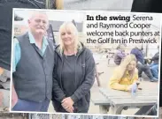  ??  ?? In the swing Serena and Raymond Cooper welcome back punters at the Golf Inn in Prestwick