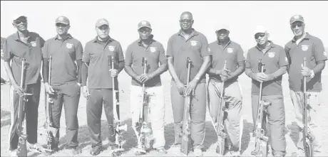  ?? ?? Paul Slowe, fourth from right with some of Guyana’s top marksmen