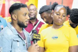  ?? ?? Delano Thomas, more popularly known as DJ 3D Renaissanc­e (left) speaks to McKenna Virgo, who goes by the stage name DJ Mac Mac, during the review session.