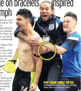 ??  ?? PUT YOUR SHIRT ON US Schindler mobbed after his penalty took Town into the top flight