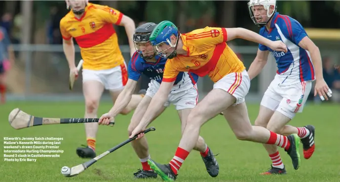  ??  ?? Kilworth’s Jeremy Saich challenges Mallow’s Kenneth Mills during last weekend’s drawn County Premier Intermedia­te Hurling Championsh­ip Round 3 clash in Castletown­roche Photo by Eric Barry