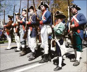  ?? Tyler Sizemore / Hearst Connecticu­t Media ?? James-Peyton Lovett, 9, of Bristol, is dressed in Revolution­ary War garb during the Battle of Ridgefield Funeral Procession and Ceremonial Salute at Olde Town Cemetery in Ridgefield on Sunday.