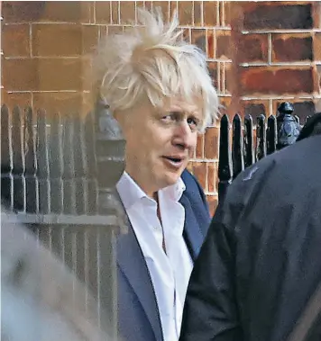  ?? ?? Boris Johnson leaves Downing Street yesterday afternoon after his wife, Carrie, had given birth to a ‘healthy baby girl’ in the morning