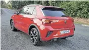  ?? ?? Top: Two years after its launch, Volkswagen’s coupé-style crossover gets a redesign. Above: Low-profile tyres and sports suspension make the range-topping T-Roc an enthusiast driver’s choice.