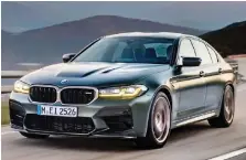  ?? ?? Dall’alto, la BMW M3 Competitio­n con il 6 cilindri da 2.993 cm³ e 510 cv; le griglie a doppio rene di ultima generazion­e sulle BMW serie M; una parte della gamma della divisione sportiva di Monaco e infine la BMW M5 CS con il V8 da 4,4 litri e 635 cv