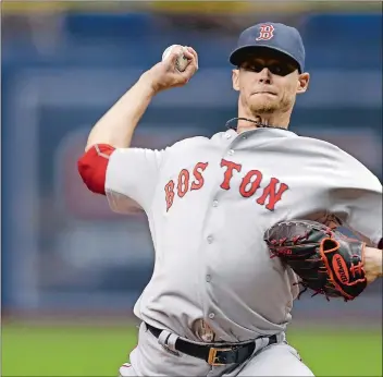  ?? CHRIS O’MEARA/AP PHOTO ?? Clay Buchholz of the Boston Red Sox pitches to the Tampa Bay Rays during the first inning Tuesday in St. Petersburg, Fla.