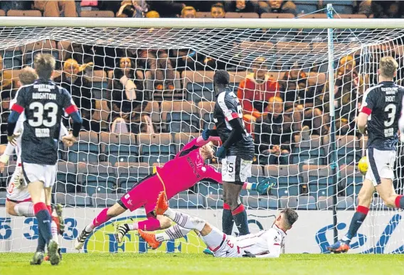  ??  ?? Dundee goalkeeper Scott Bain was in fine form at Dens on Saturday as the Dark Blues played out a 0-0 draw with Ross County.