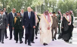  ?? SPA; AFP ?? Far left, Prince Badr bin Sultan, deputy governor of Makkah, welcomes Palestinia­n President Mahmoud Abbas; left Lebanese caretaker Prime Minister Najib Mikati arrives