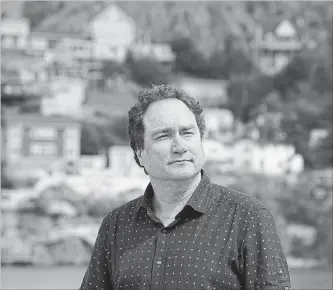  ?? PAUL DALY THE CANADIAN PRESS ?? Mark Critch’s new book, " Son of a Critch," highlights his love for his hometown of St. John’s.