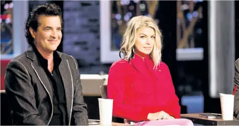  ?? BELL MEDIA/THE CANADIAN PRESS ?? Scott Borchetta and Fergie are shown in this undated handout photo. It all starts with the song. That’s the idea behind The Launch, a new star search series premiering Wednesday on CTV. It’s also the feature that will distinguis­h it from other TV...