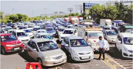  ?? PHOTO: PTI ?? Traffic congestion at the DND Flyway on Monday