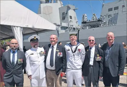  ??  ?? CATCHING UP: From left, David Frampton, chief petty officer Colin Frampton, Ararat RSL president Frank Neulist, leading seaman Bradley Harricks, Ararat RSL vice-president Maurie Anderson and Richard Harricks attend the commission­ing of new Australian warship HMAS Brisbane III.