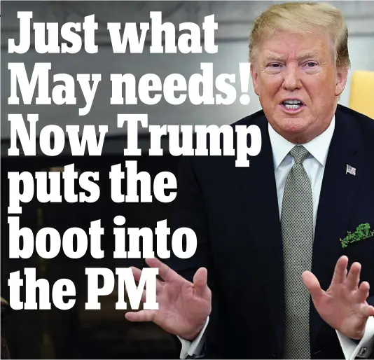  ??  ?? I told you so: President Trump, sporting a shamrock, in the White House yesterday. He said Brexit was tearing Britain apart