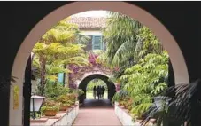  ?? Brian van der Brug Los Angeles Times ?? THE LUSHLY landscaped Four Seasons Biltmore is among eight hotels in Santa Barbara offering travelers a third night free.